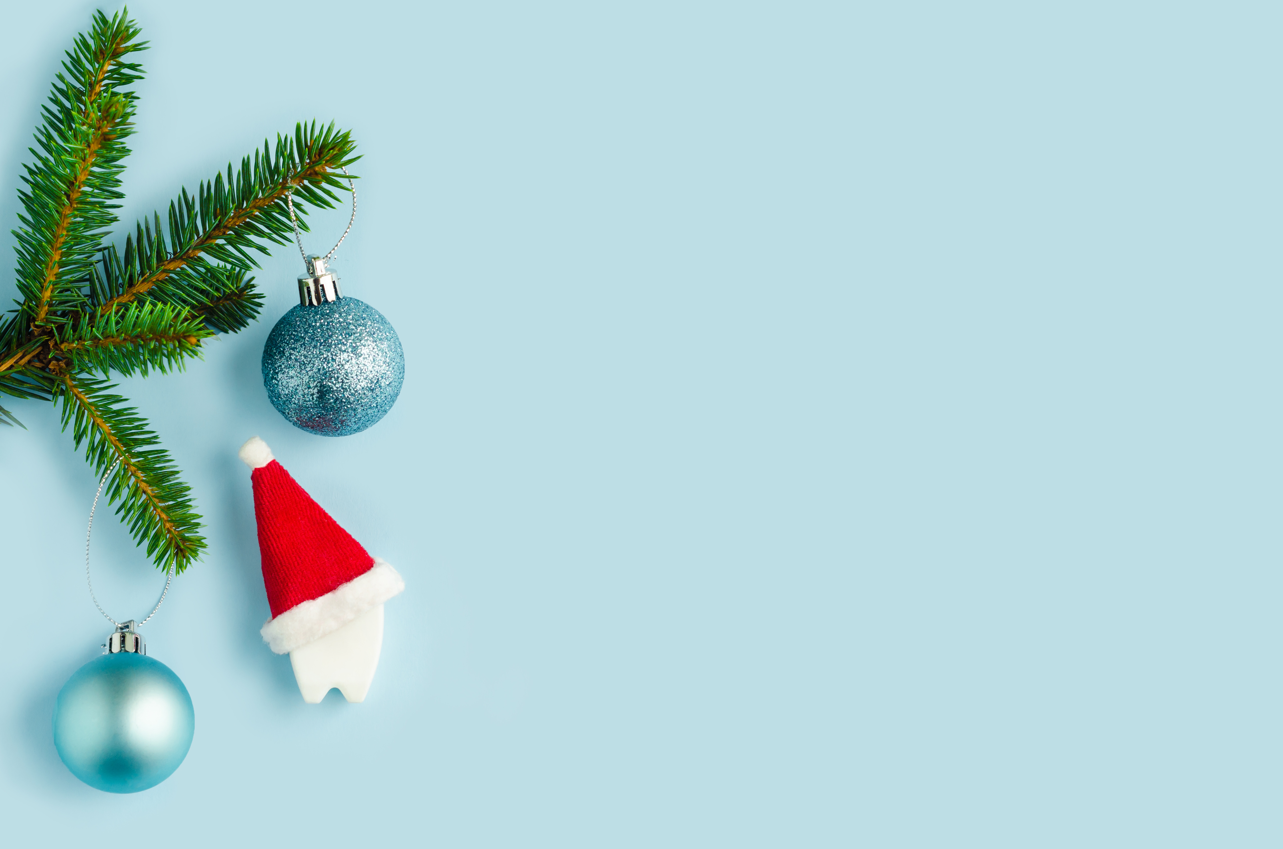 Tooth,In,Santa,Hat,Under,Christmas,Tree,,Fir,On,Blue Holiday Hours